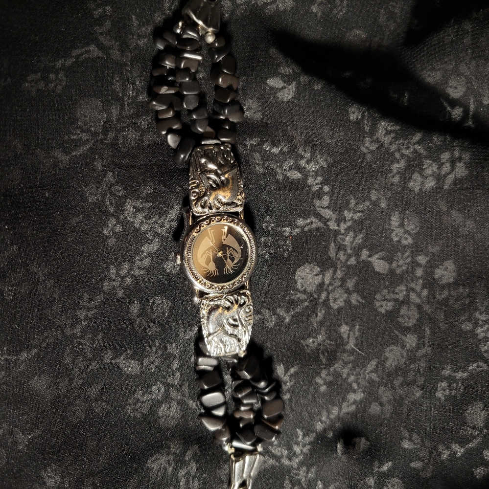 Black and silver Legacy watch